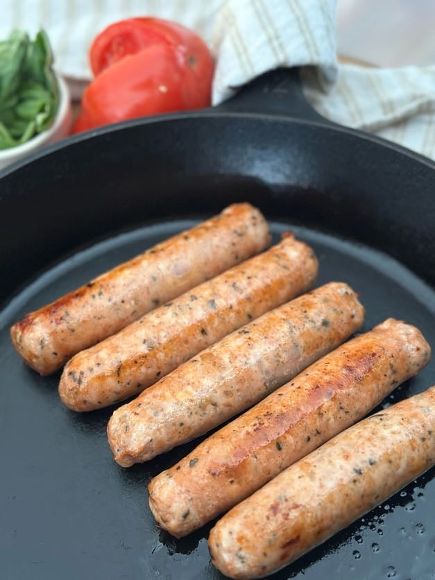 Cooked Local Chicken Sausages in a Pan