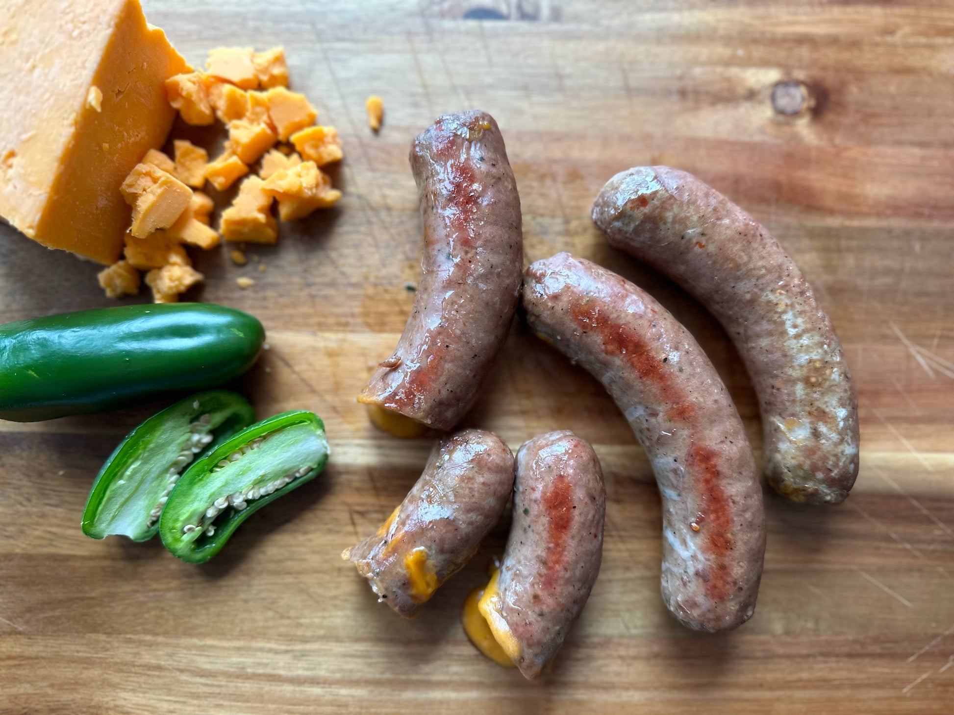 High-quality beef sausages from Yankee Flats Meats ready for grilling