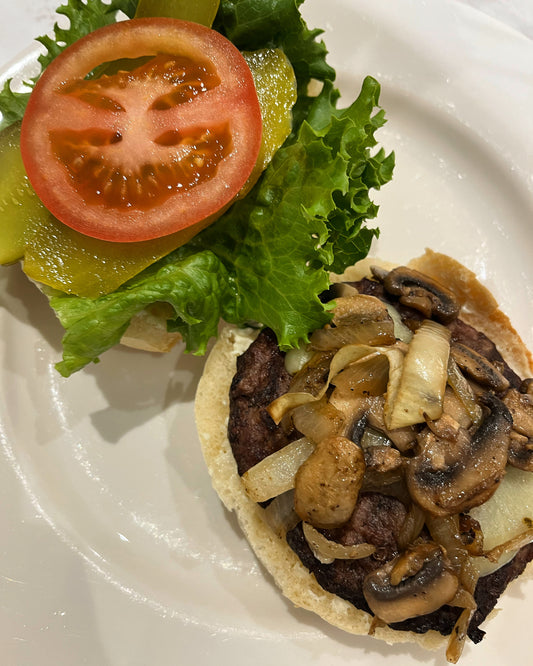 Delicious beef and chicken burger patties ready for cooking, made from high-quality meat at Yankee Flats Meats